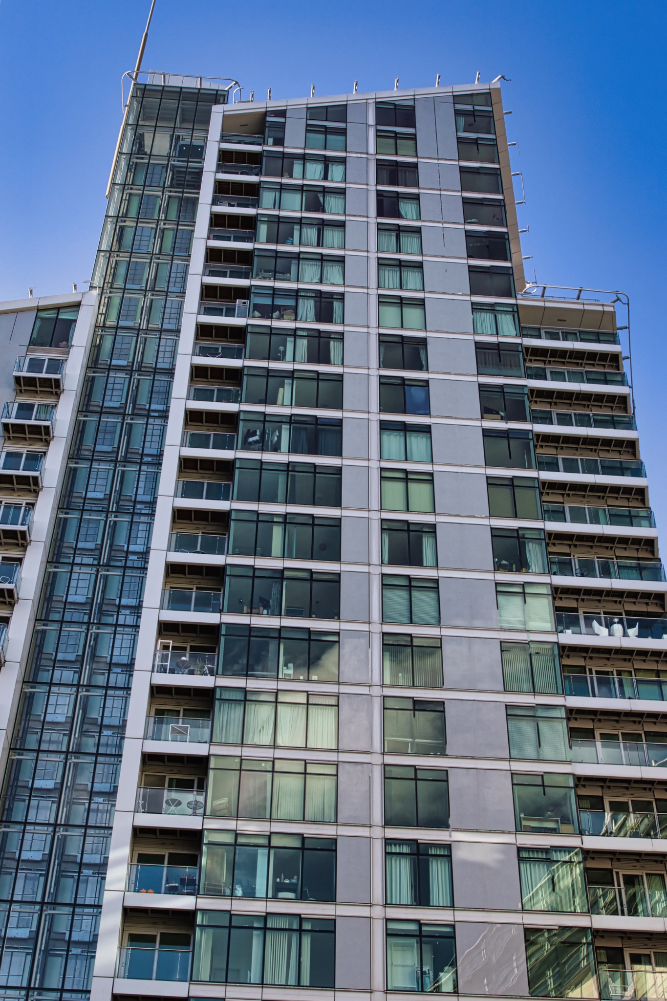 Modern Apartment Building with Balconies in Manchester, UK.